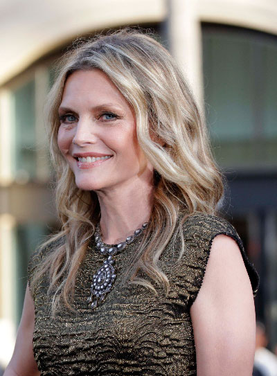 Actress Michelle Pfeiffer arrives for the premiere of Dark Shadows at