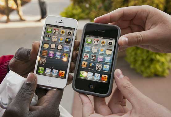 iPhone 5 sales slowing down on news that it gets â€˜very hotâ€™